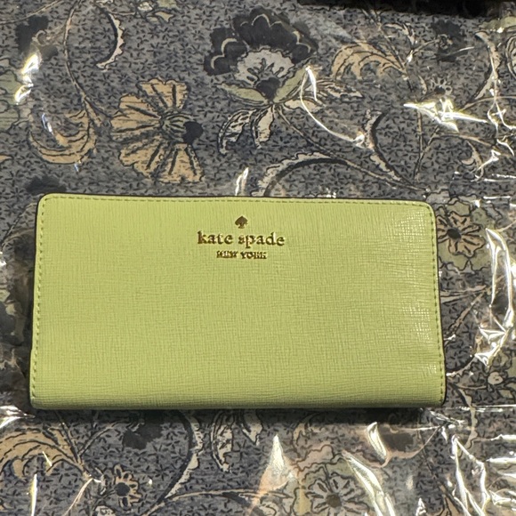 kate spade Handbags - kate spade light green continental wallet with gold logo